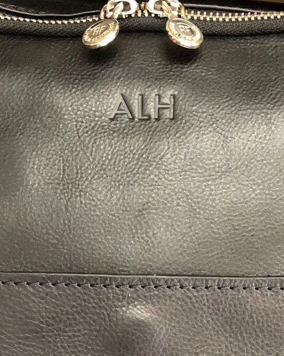 Embossing your initials on the bag