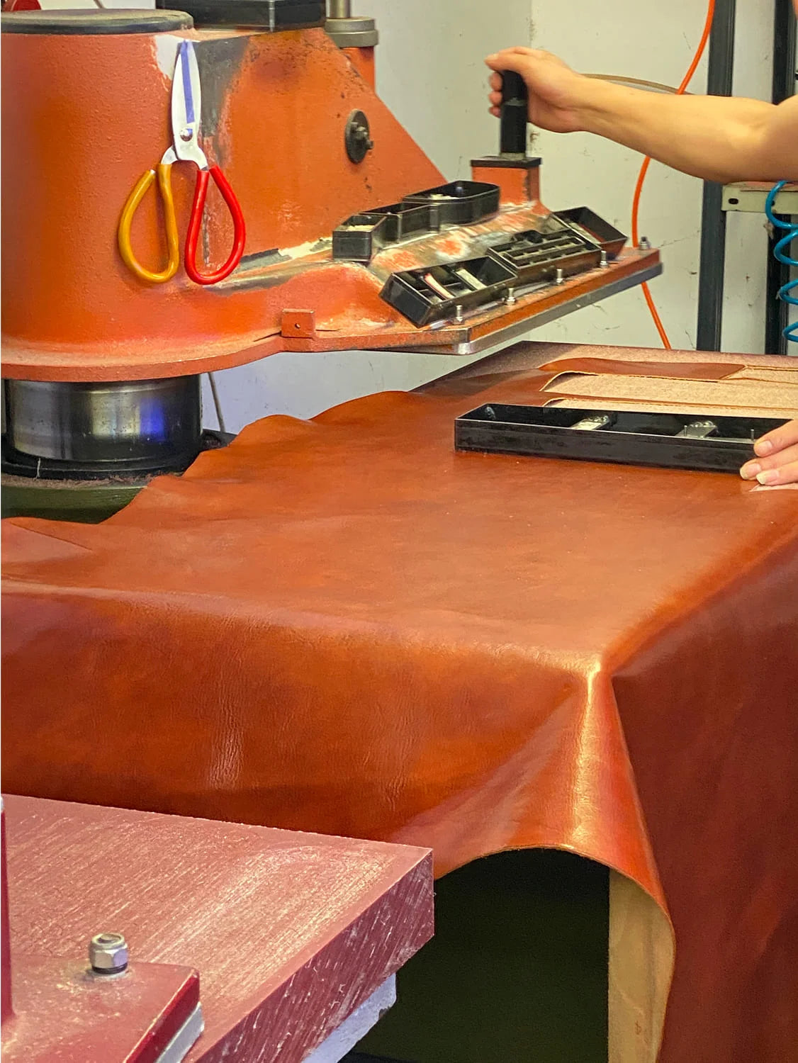 Leather being cut