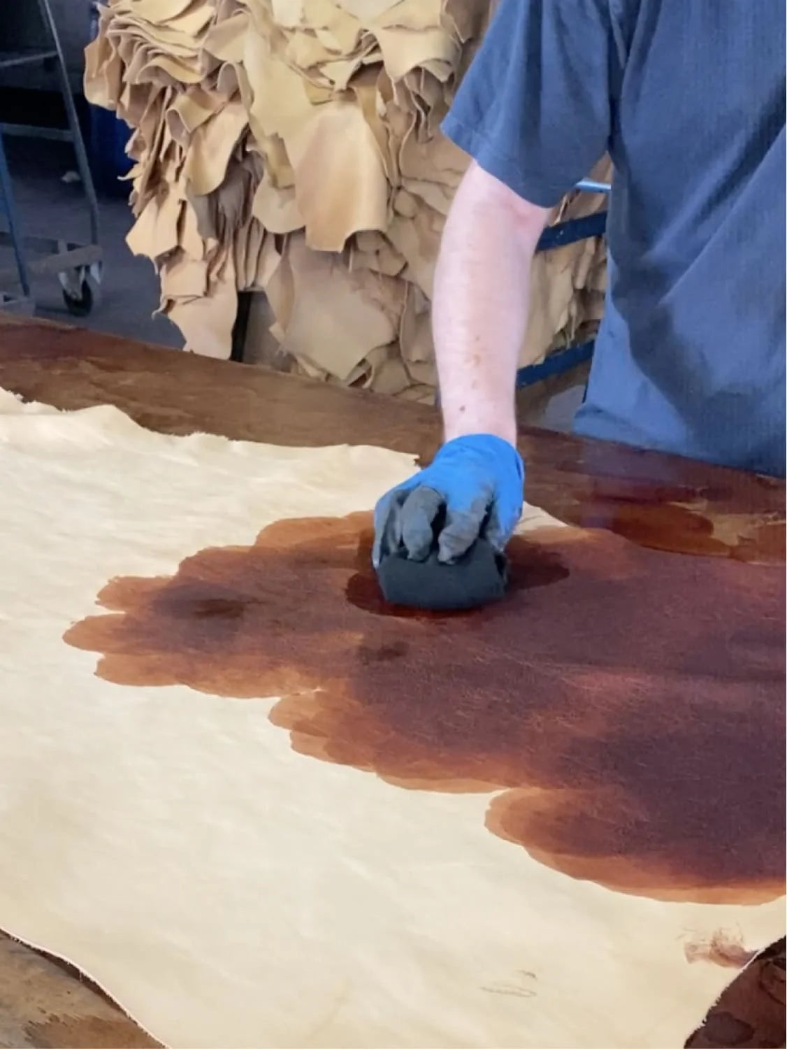 Hand-dyeing the leather